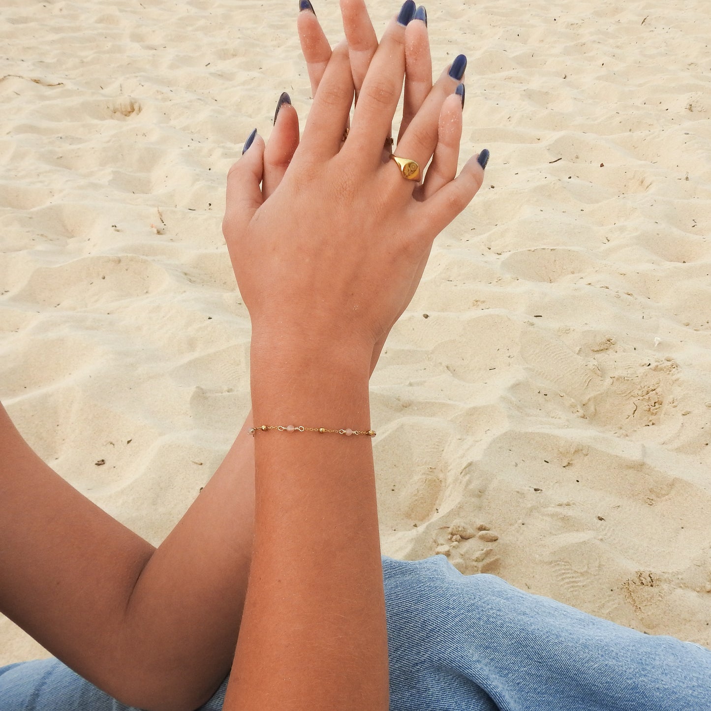 June birthstone bracelet with interchanging gold pebbles and moonstone gemstones