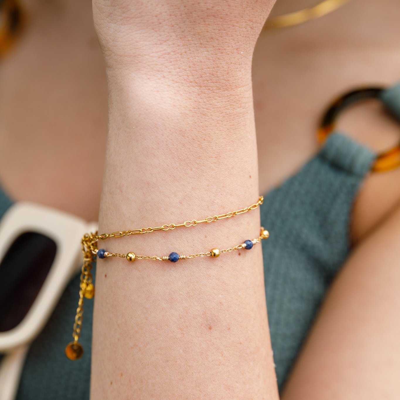 September birthstone bracelet with interchanging gold pebbles and gemstones