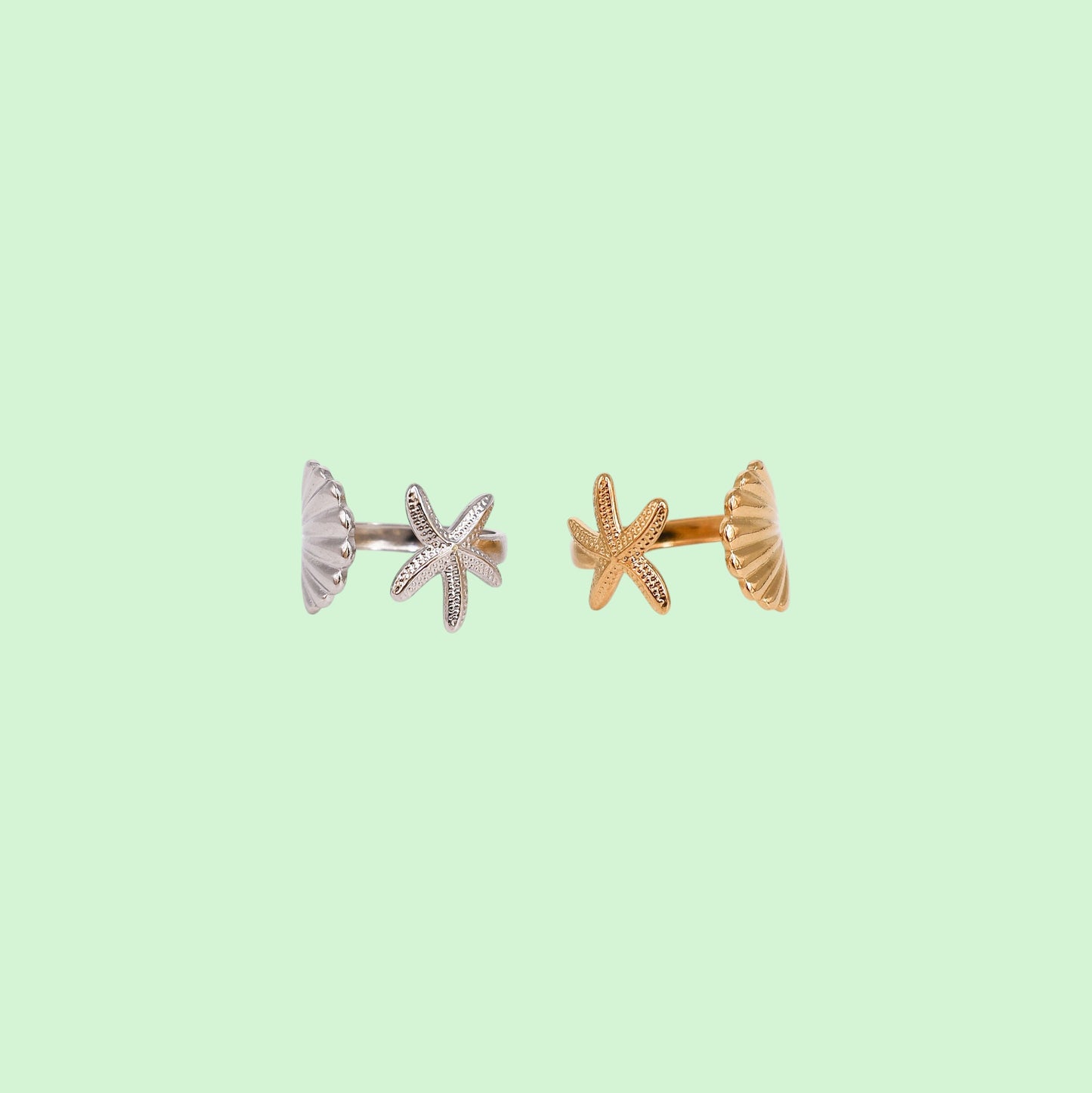 Shell & Starfish adjustable rings in gold and silver on a light green background